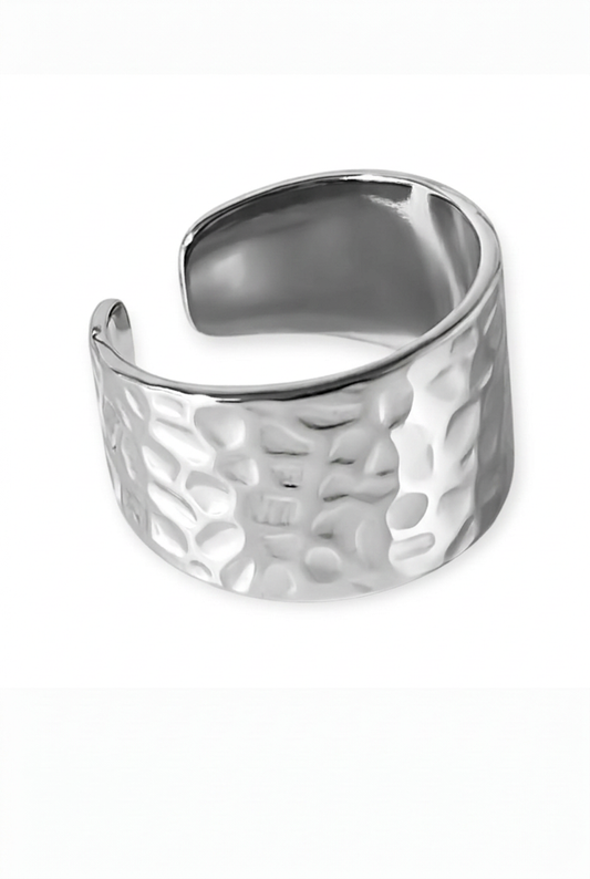 Bright silver-tone hammered cuff ring on a white background