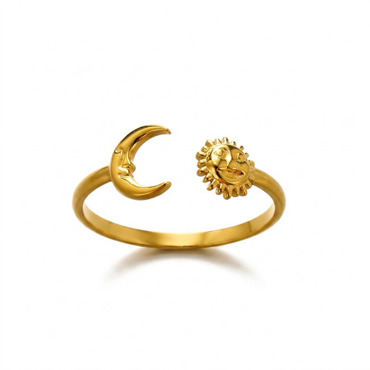 Gold-tone sun and crescent moon adjustable ring on a white background
